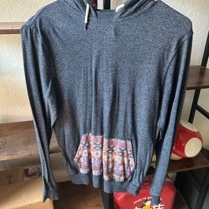 On the Byas Charcoal Hoodie with Vibrant Accents